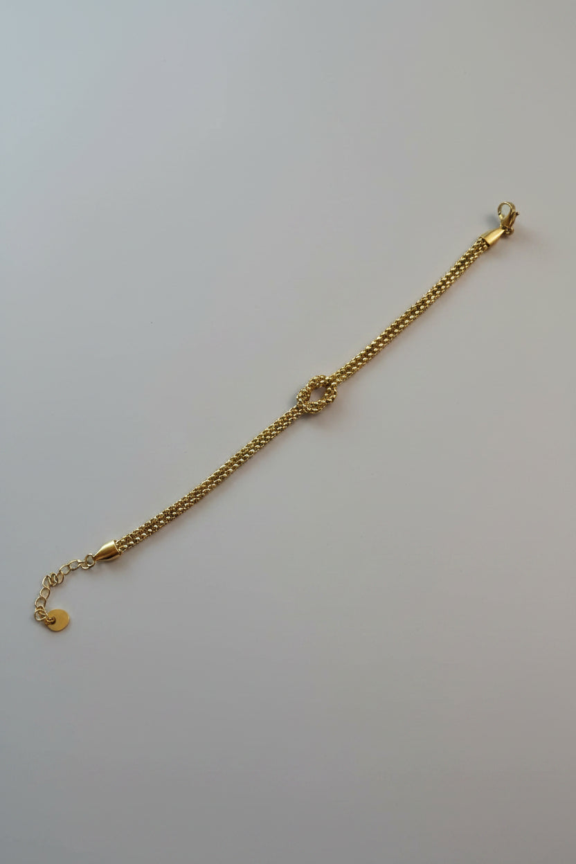 Bracciale a Maglia con Nodo di Giunzione in Acciaio Dorato