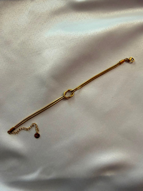 Bracciale a Cordino con Nodo di Giunzione in Acciaio Dorato