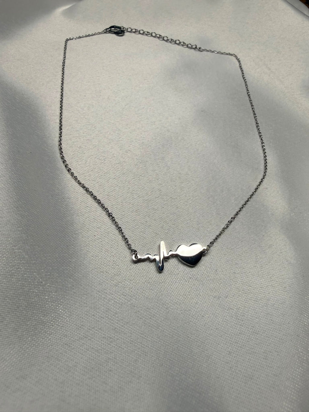 Pulsus Argento — Collana Battito Cardiaco con Cuore in Acciaio