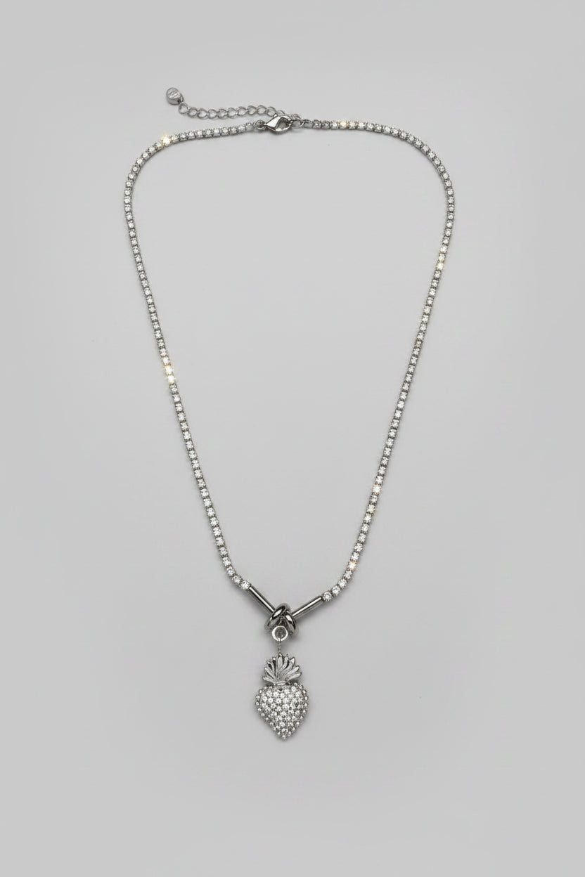 Cor Tennis — collana tennis con brillantini e cuore sacro pavé in acciaio argento