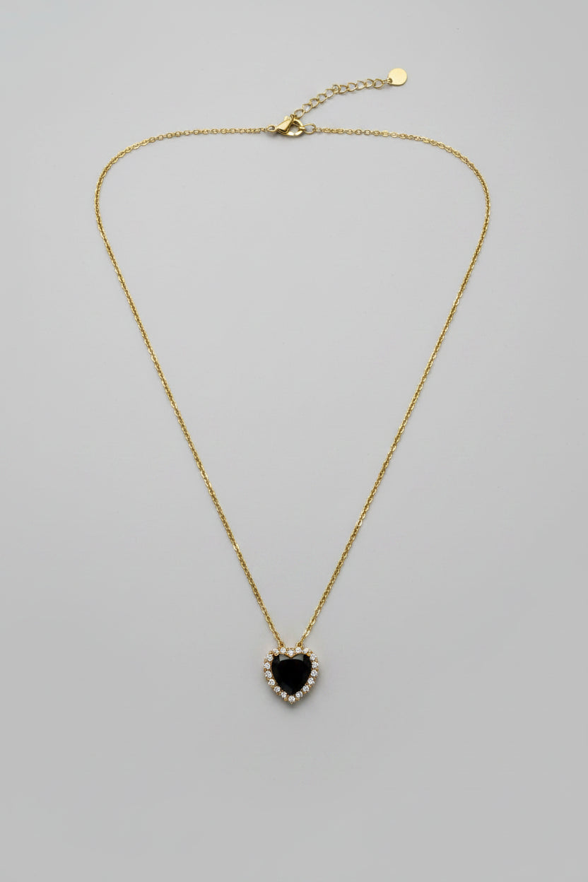 Cor Noctis — collana punto luce cuore nero con brillantini in acciaio dorato