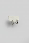 Orbis Caelatus — orecchini a cerchio huggie martellato 19mm in acciaio argento, coppia