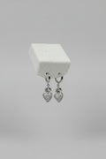 Cor Ignis Hoop — orecchini a cerchio huggie con cuore sacro pavé pendente in acciaio argento, coppia