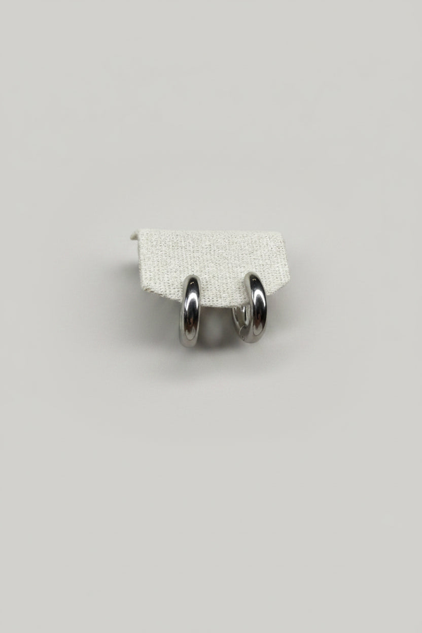 Cerchio Liscio — orecchini a cerchio classico aperto 18mm in acciaio argento lucido, coppia